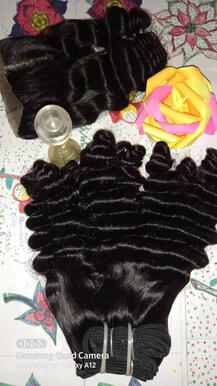 16inches deep curl and a closure. Natural color. 55k